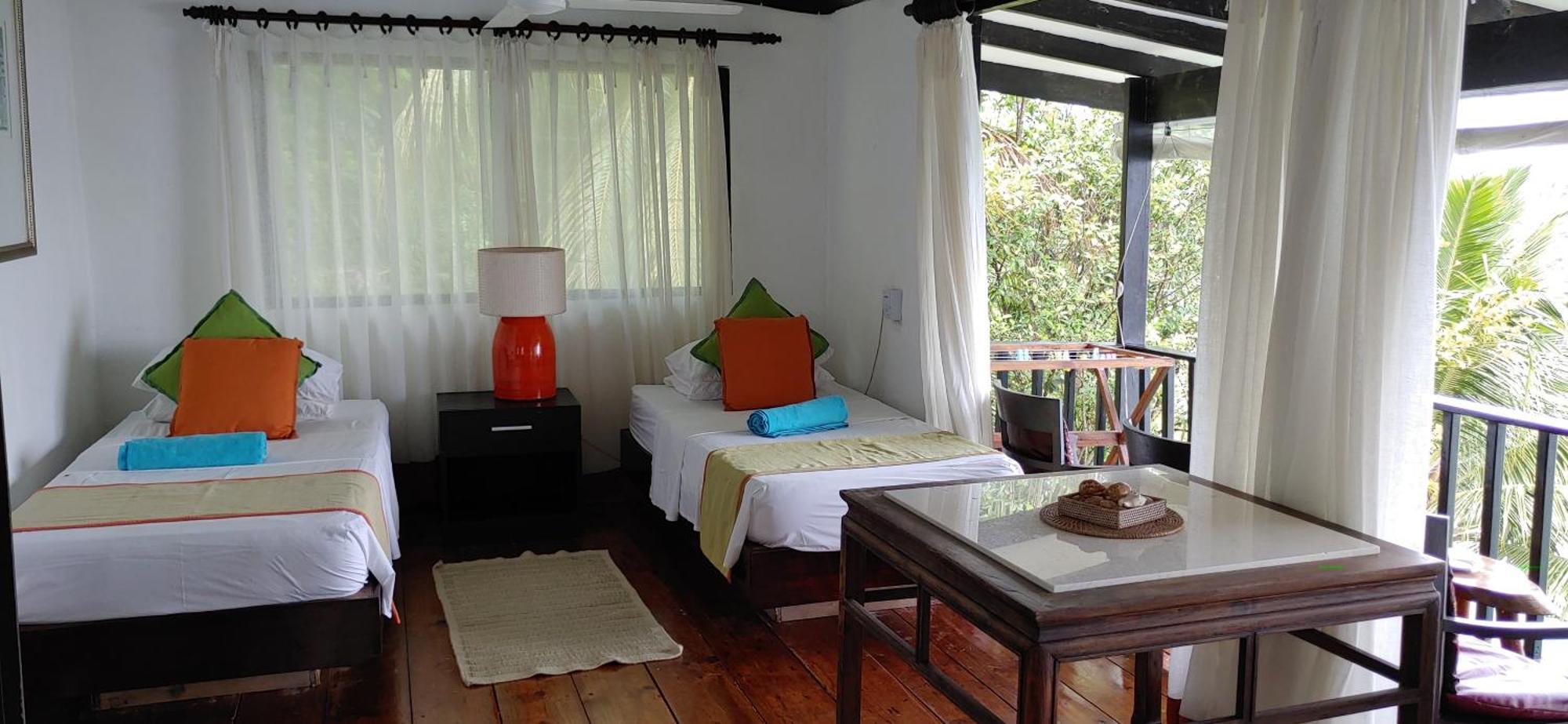 Mango Lodge Anse Volbert Village Habitación foto